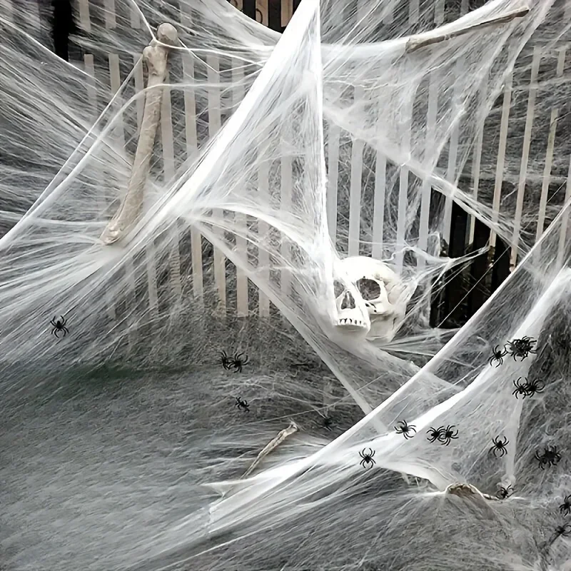 伸縮性のある蜘蛛の巣飾り。各飾りに蜘蛛が2匹ずつ付いています - Spider Web Halloween Decoration のレビューと価格